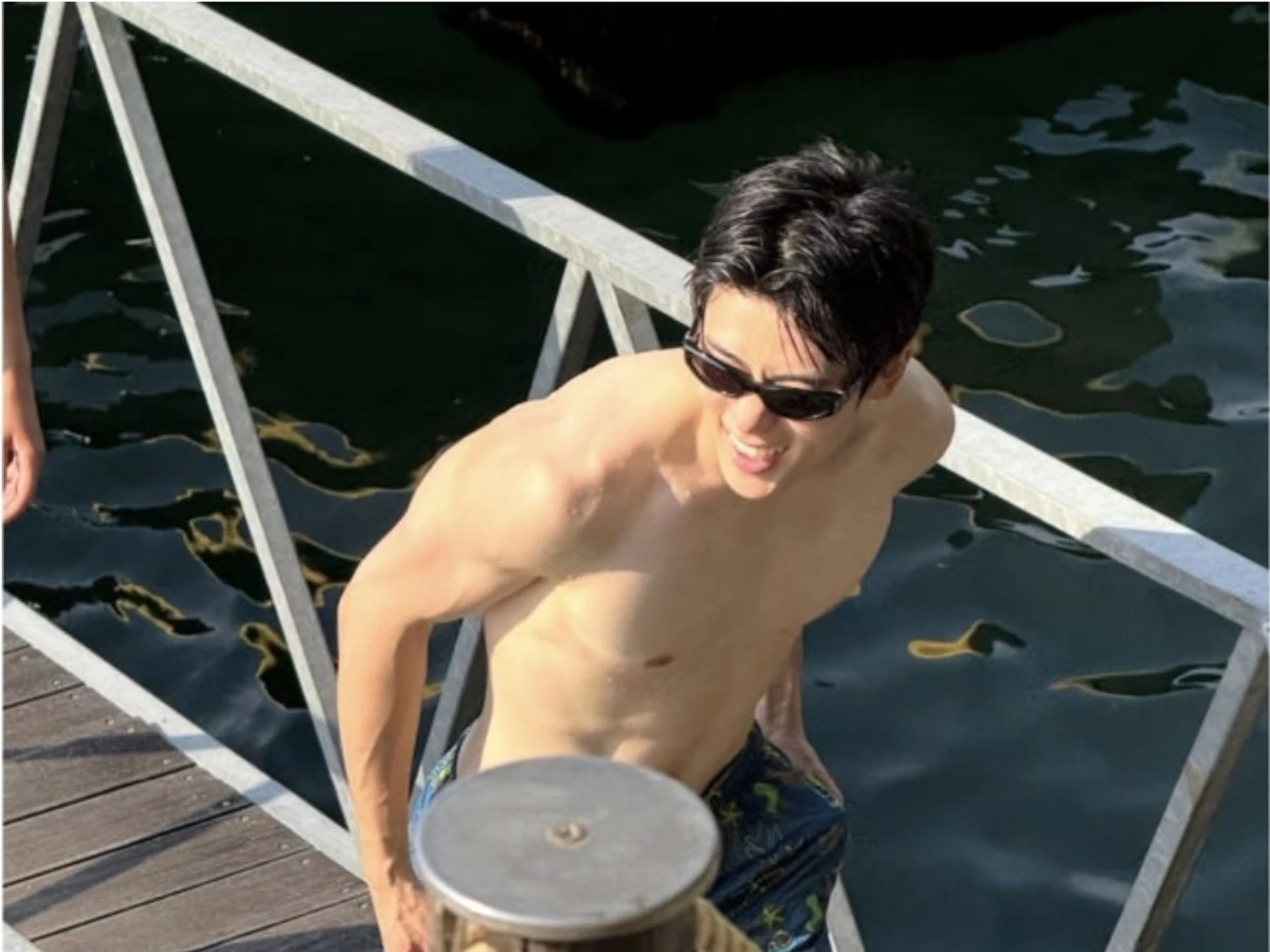 NCT Jaehyun, itinanggi ang love rumor na babae sa bikini sa mga larawan ng bakasyon na “pinsang nakababatang kapatid” lang
