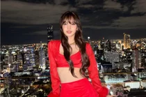 BLACKPINK’s Lisa Stuns in Bangkok With Daring, Reversal Dress Look
