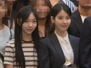 아이유, 경호원 결혼식서 축가 열창…의리 빛난 단정한 하객룩
