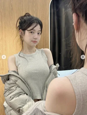Lee Yu-bi, just wearing a padded vest over a sleeveless top... 