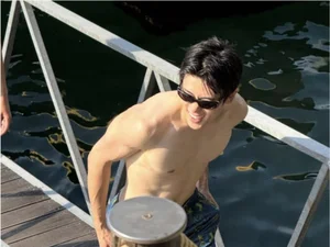 NCT Jaehyun Denies Dating Rumors Over Bikini Woman in Vacation Photos, Calls Her a “Cousin”